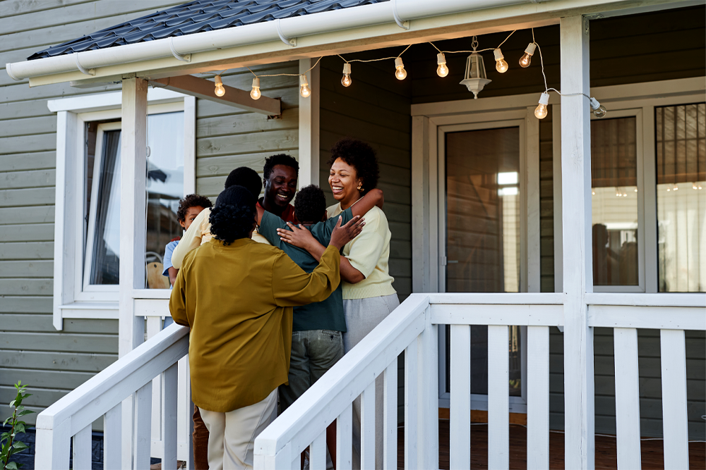 Family connection on the porch outside of a house