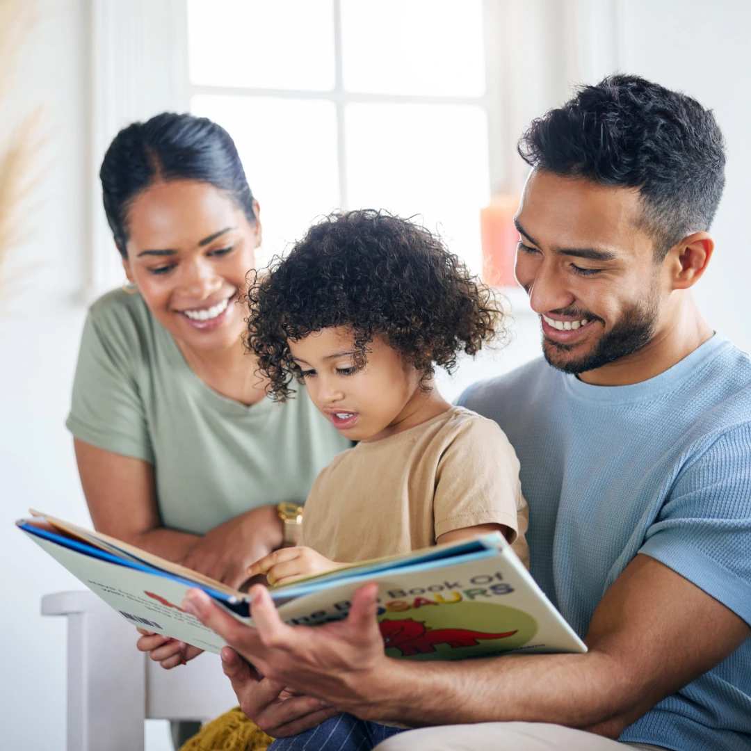 Parents offering emotional support to their teenage daughter, representing family connection and compassionate care.