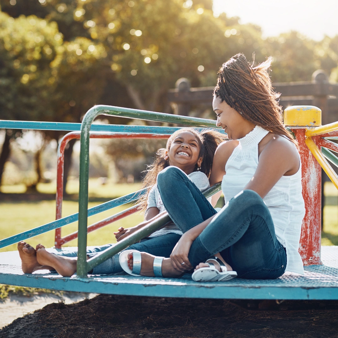 Smiling adolescent and two team members walking together outdoors — you don’t have to walk this path alone.